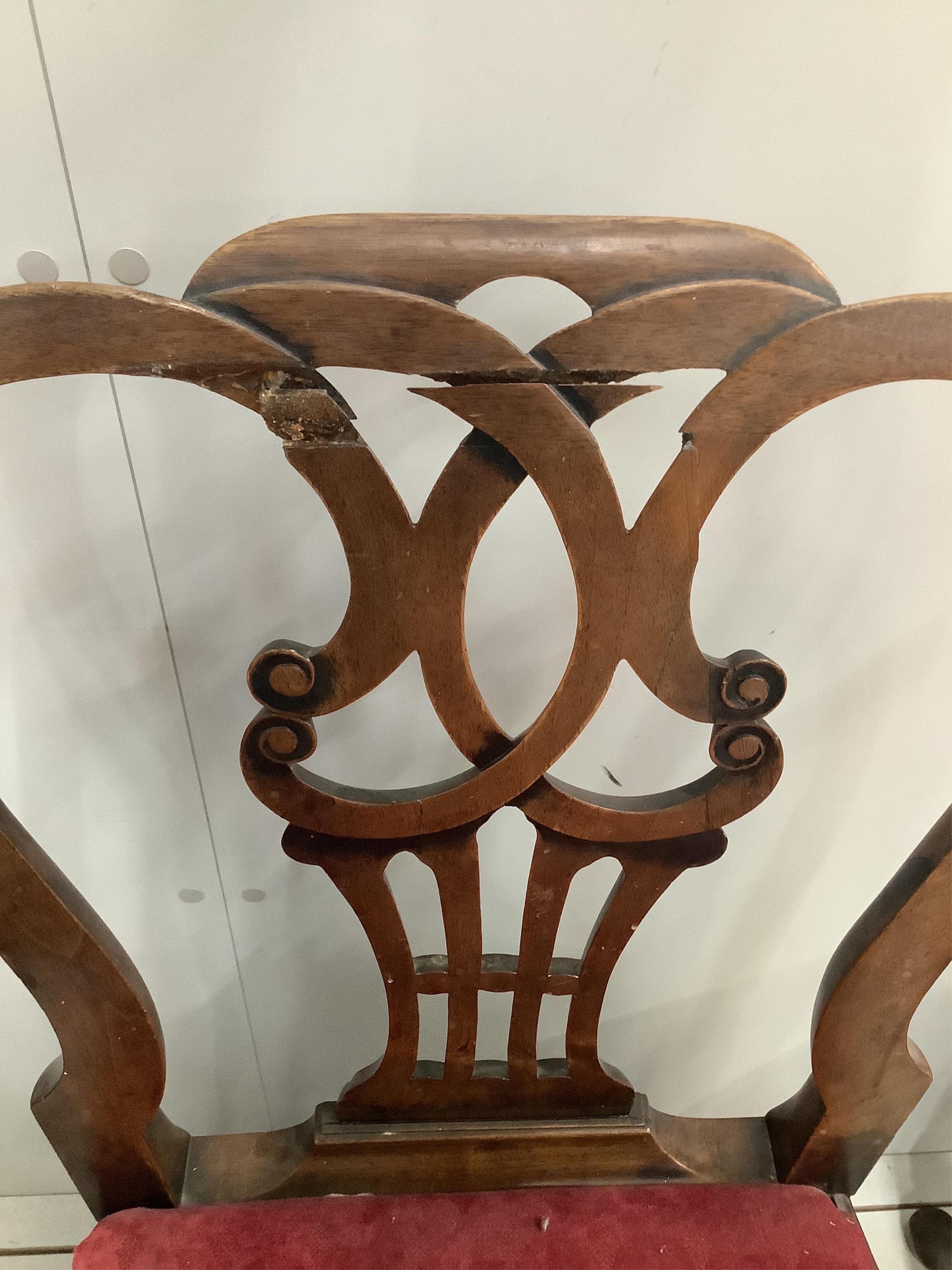 A set of six George II walnut dining chairs. Condition - poor to fair, two requiring extensive restoration